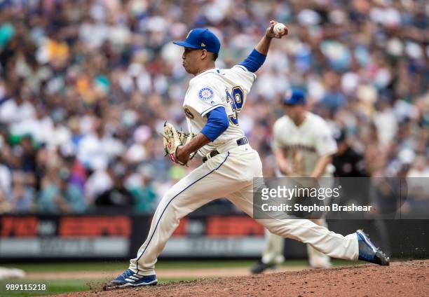 Reliever Edwin Diaz of the Seattle Mariners delivers a pitch during the ninth inning of a game against the Kansas City Royals at Safeco Field on July...