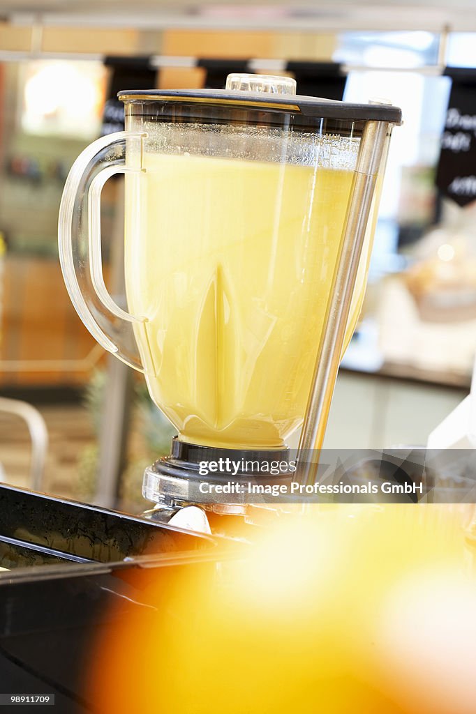 Fruit shake in juicer, close-up