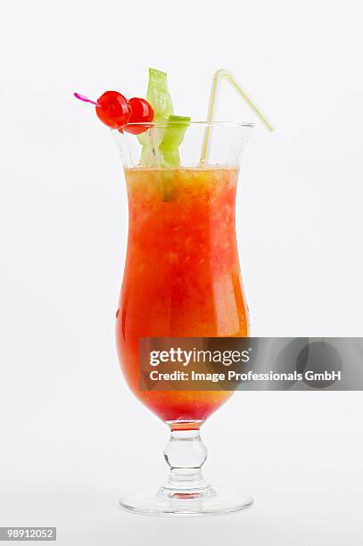 tequila sunrise on white background, close-up - tequila sunrise stockfoto's en -beelden