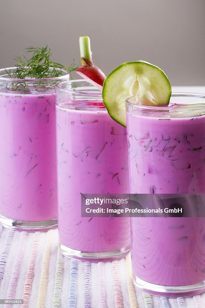 Cold beetroot soup in glasses, close-up