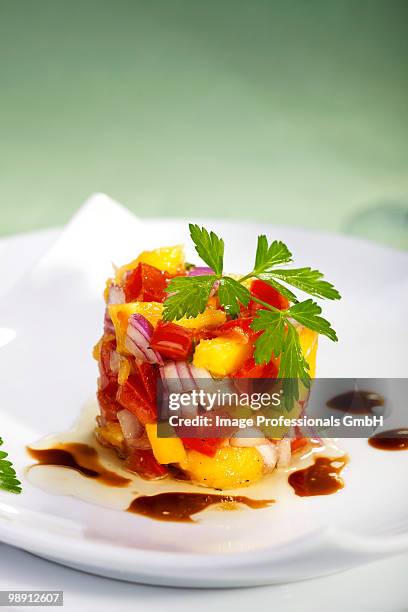 fresh mango tomato salsa, close-up - mango salsa stock pictures, royalty-free photos & images