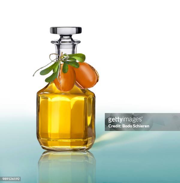 argan oil in a carafe - argan oil stock-fotos und bilder