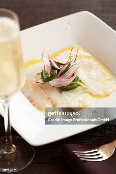 halibut sashimi on plate, elevated view, close-up - vierkant bord stockfoto's en -beelden