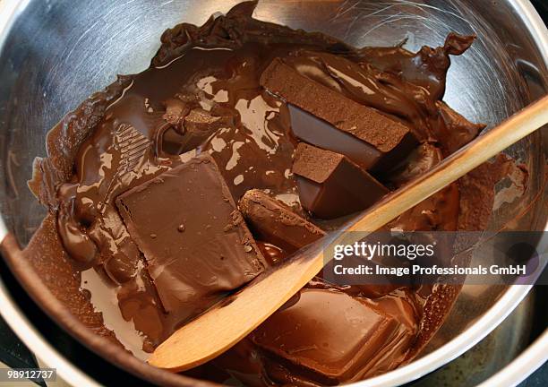 melting chocolate couverture, close-up - couverture stock pictures, royalty-free photos & images