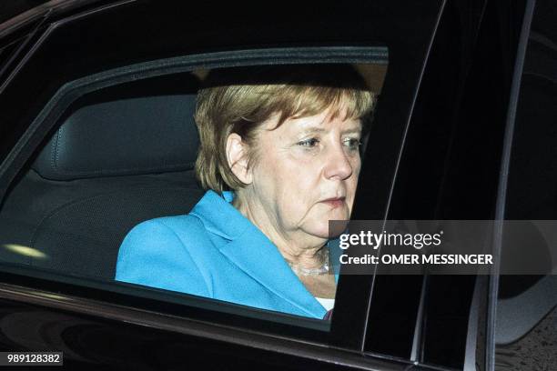 German Chancellor and leader of the Christian Democratic Union Angela Merkel leaves after a party leadership meeting at the CDU headquarters in...