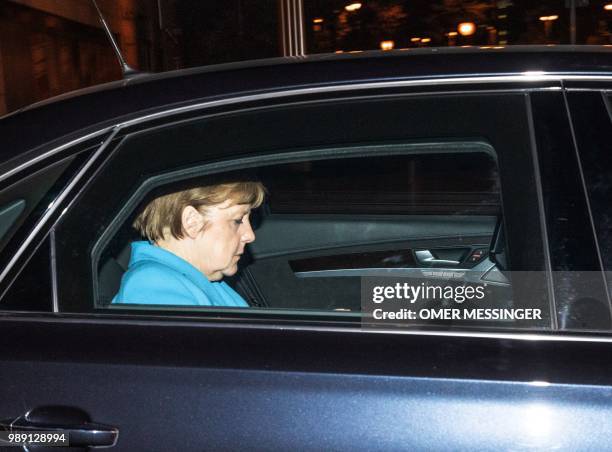 German Chancellor and leader of the Christian Democratic Union Angela Merkel leaves after a party leadership meeting at the CDU headquarters in...