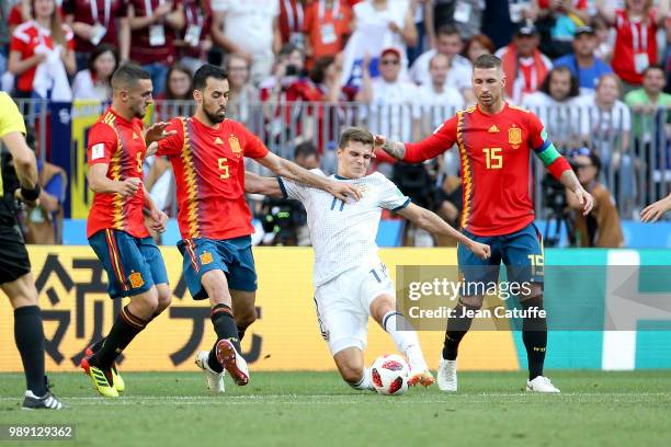 Roman Zobnin of Russia between Koke, Sergio Busquets, Sergio Ramos of Spain during the 2018 FIFA World Cup Russia Round of 16 match between Spain and...
