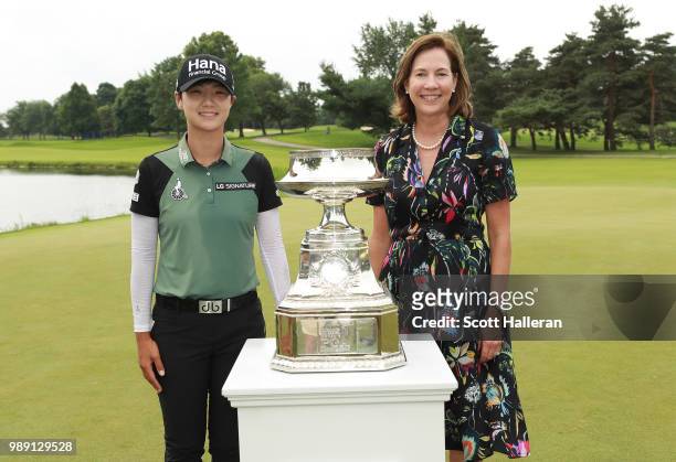 Sung Hyun Park of South Korea poses alongside the trophy with Lynne Doughtie, U.S. Chairman and CEO of KPMG, after winning the KPMG Women's PGA...