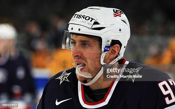 Matt Gilroy of USA looks dejected during the IIHF World Championship group D match between USA and Germany at Veltins Arena on May 7, 2010 in...