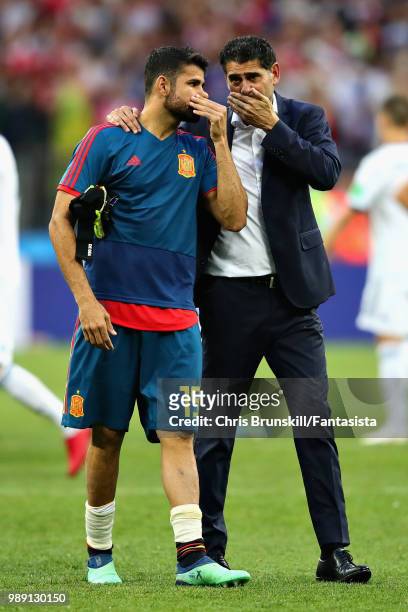 Head Coach of Spain Fernando Hierro looks dejected with Diego Costa of Spain after the 2018 FIFA World Cup Russia Round of 16 match between Spain and...