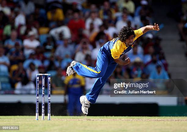 Lasith Malinga of Sri Lanka bowls during The ICC World Twenty20 Super Eight Match between The West Indies and India played at The Kensington Oval on...