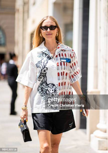 Pernille Teisbaek wearing Prada button shirts and shorts is seen outside Hermes Resort during Paris Fashion Week Haute Couture FW18 on July 1, 2018...