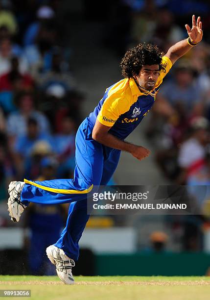 Sri Lankan bowler Lasith Malinga delivers during the ICC World Twenty20 Super Eight match between West Indies and Sri Lanka at the Kensington Oval on...