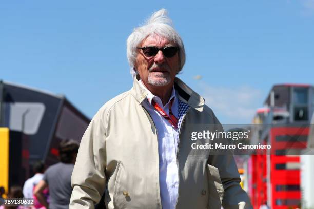 Former F1 boss Bernie Ecclestone walks down the paddock ahead of the Austrian Formula One.
