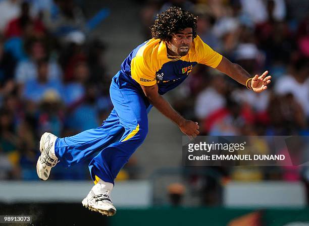 Sri Lankan bowler Lasith Malinga delivers a ball during the ICC World Twenty20 Super Eight match between West Indies and Sri Lanka at the Kensington...