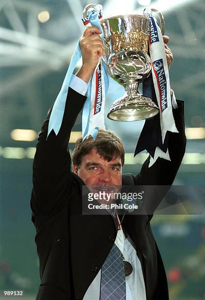Bolton manager Sam Allardyce celebrates his team gaining promotion to the Premiership during the match between Bolton Wanderers and Preston North End...
