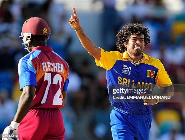 Sri Lankan bowler Lasith Malinga celebrates after taking the wicket of West Indies batsman Andre Fletcher during the ICC World Twenty20 Super Eight...