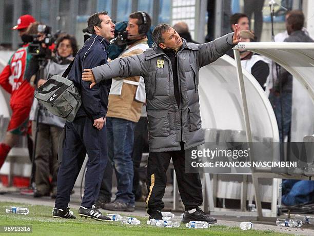 Arles-Avignon's coach Michel Estevan reacts at the end of the French L2 football match Sedan vs. Arles-Avignon, on May 7, 2010 in Sedan, northeastern...