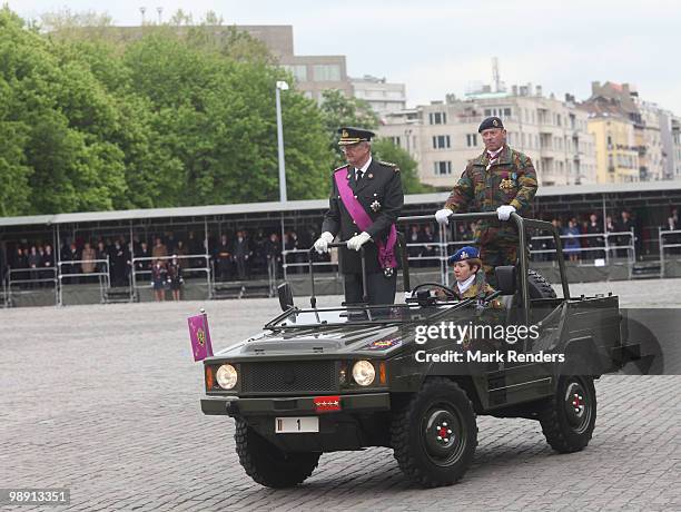 King Albert from Belgium inspects the troops as he assists a memorial ceremony for the end of WWII at Esplanade du Cinquantenaire on May 7, 2010 in...