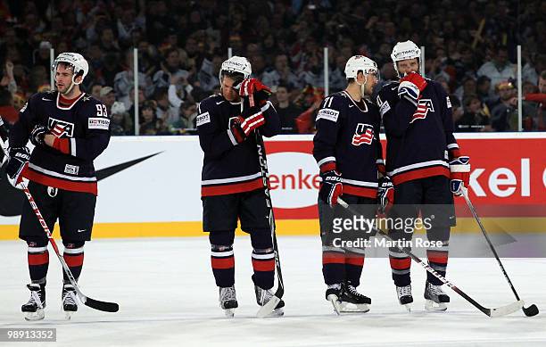 The team of USA look dejected after the IIHF World Championship group D match between USA and Germany at Veltins Arena on May 7, 2010 in...