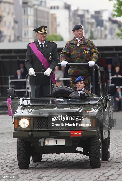 King Albert from Belgium inspects the troops as he assists a memorial ceremony for the end of WWII at Esplanade du Cinquantenaire on May 7, 2010 in...