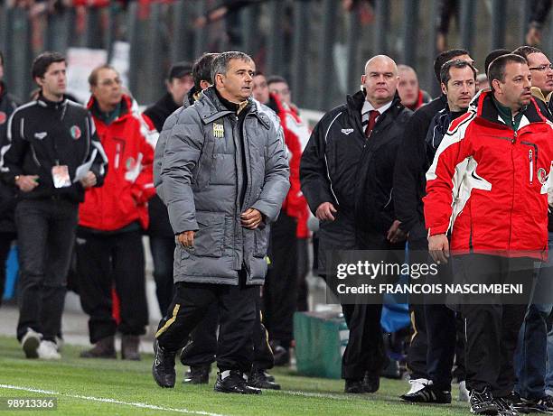 Arles-Avignon's coach Michel Estevan leaves the field at the end of the French L2 football match Sedan vs. Arles-Avignon, on May 7, 2010 in Sedan,...