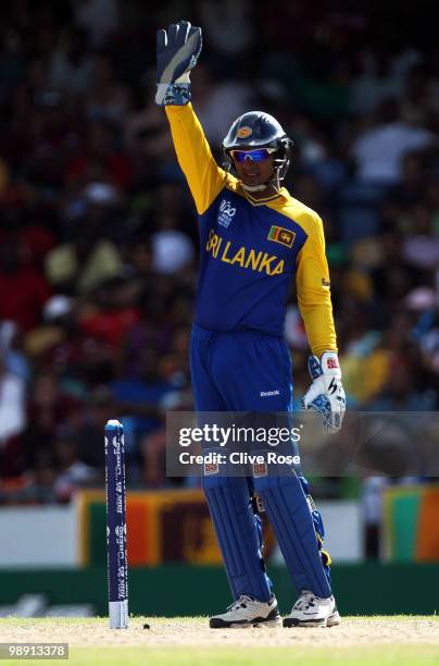 Kumar Sangakkara of Sri Lanka signals in the field during the ICC World Twenty20 Super Eight match between West Indies and Sri Lanka at the...