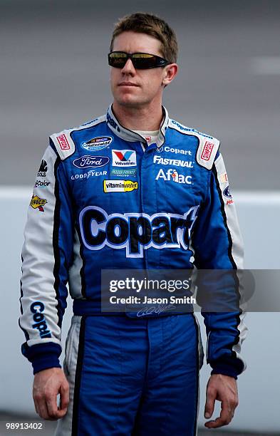 Carl Edwards, driver of the Copart Ford, looks on during qualifying for the NASCAR Nationwide series Royal Purple 200 presented by O'Reilly Auto...