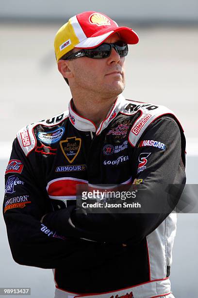 Kevin Harvick, driver of the Rheem Ruud Chevrolet, looks on during qualifying for the NASCAR Nationwide series Royal Purple 200 presented by O'Reilly...
