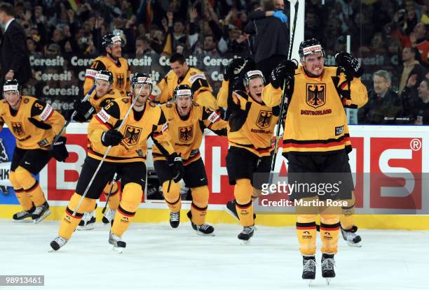 Constatin Braun of Germany celebrates after the IIHF World Championship group D match between USA and Germany at Veltins Arena on May 7, 2010 in...