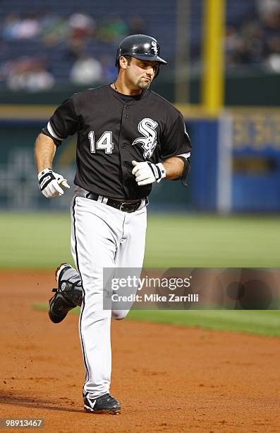 Chicago first baseman Paul Konerko rounds the bases after a 3rd inning home run during the game between the Atlanta Braves and Chicago White Sox at...