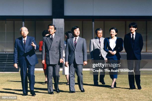 Emperor Hirohito, Crown Prince Akihito, Prince Naruhito, Prince Hitachi, Crown Princess Michiko and Prince Fumihito attend a photo session at a...