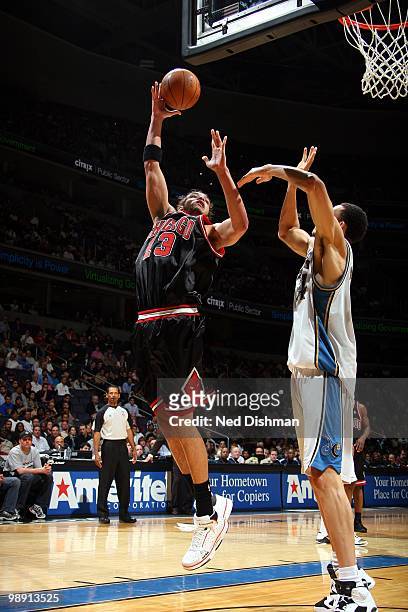 Joakim Noah of the Chicago Bulls puts a shot up against the Washington Wizards during the game at the Verizon Center on April 2, 2010 in Washington,...