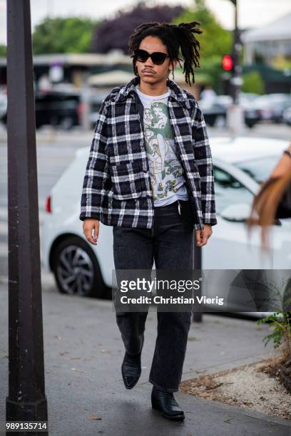 Luka Sabbat wearing checked jacket is seen outside Vetements during Paris Fashion Week Haute Couture FW18 on July 1, 2018 in Paris, France.