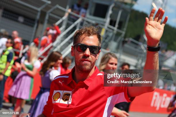 Sebastian Vettel of Germany and Scuderia Ferrari in the paddock during the Formula One Grand Prix of Austria.