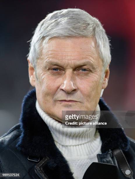 Cologne's sports director Armin Veh gives an internview prior to the German Bundesliga soccer match between Bayern Munich and 1. FC Cologne in the...
