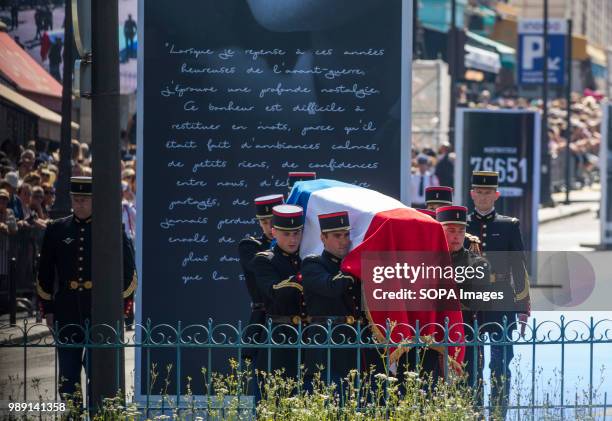 Soldiers are seen carrying caskets of Simone and Antoine Veil during the ceremony. Burial ceremony at the Pantheon of former French politician and...