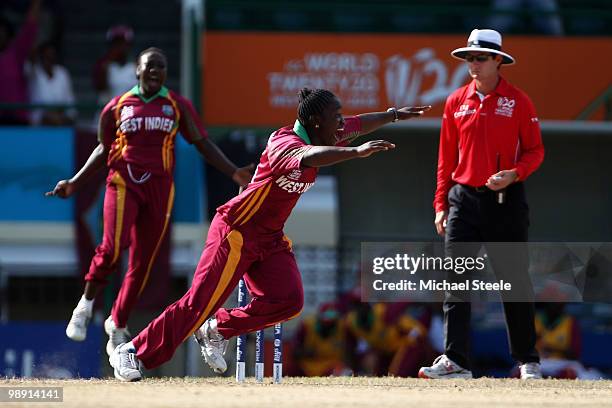 Deandra Dottin of West Indies celebrates bowling Beth Morgan during the ICC T20 Women's World Cup Group A match between West Indies and England at...