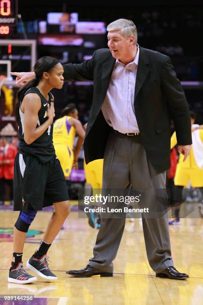 Head coach Bill Laimbeer discussing with Moriah Jefferson of the Las Vegas Aces play on the floor against the Los Angeles Sparks during a WNBA...