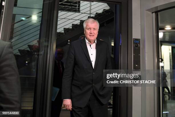 German Interior Minister and leader of the Christian Social Union Party Horst Seehofer leaves after a party leadership meeting at the CDU...