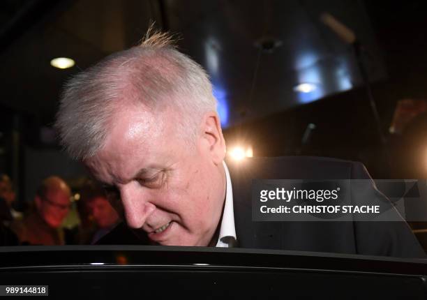 German Interior Minister and leader of the Christian Social Union Party Horst Seehofer leaves after a party leadership meeting at the CDU...
