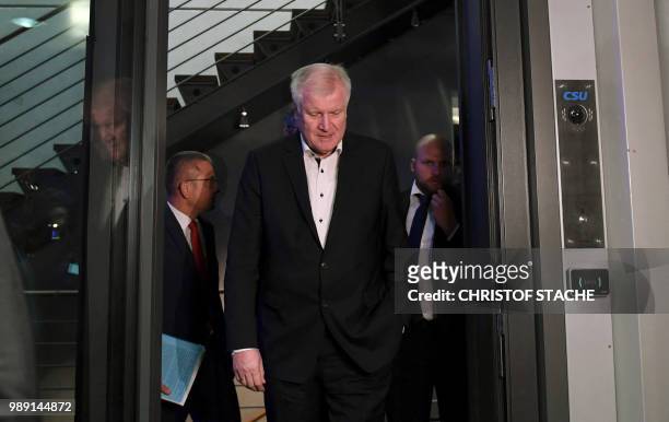 German Interior Minister and leader of the Christian Social Union Party Horst Seehofer leaves after a party leadership meeting at the CDU...