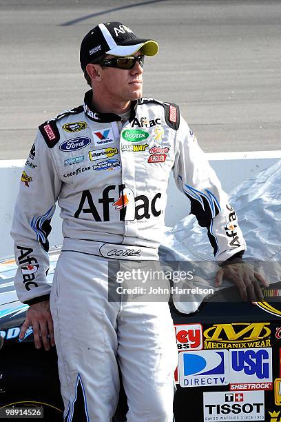 Carl Edwards, driver of the Aflac Ford, looks on during qualifying for the NASCAR Sprint Cup Series SHOWTIME Southern 500 at Darlington Raceway on...