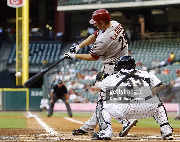 Adam LaRoche of the Arizona Diamondbacks singles on a line drive to right field against the Houston Astros at Minute Maid Park on May 6, 2010 in...