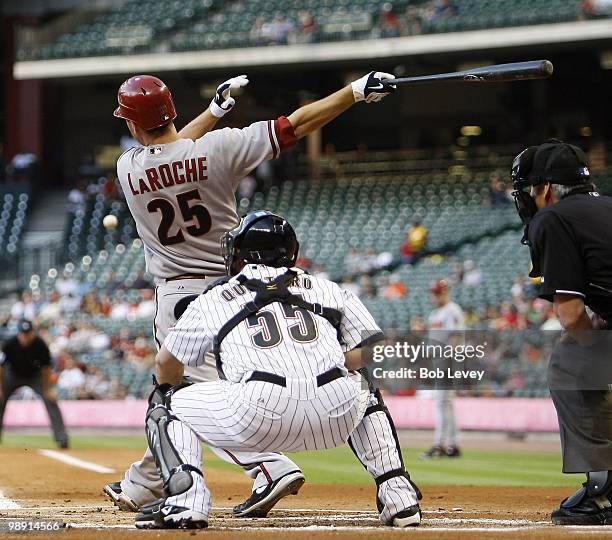 Adam LaRoche of the Arizona Diamondbacks singles on a line drive to right field against the Houston Astros at Minute Maid Park on May 6, 2010 in...