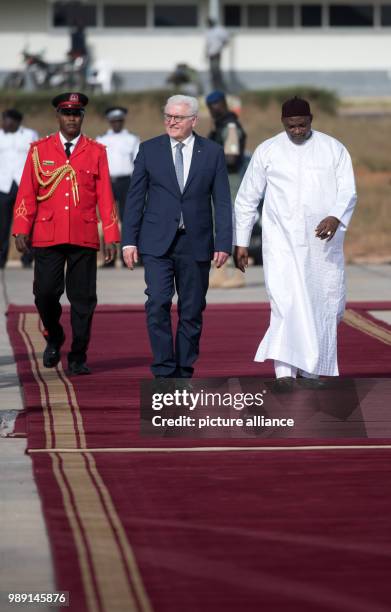 German President Frank-Walter Steinmeier is bidden farewell with military honours by the president of the Republic of The Gambia, Adama Barrow, at...