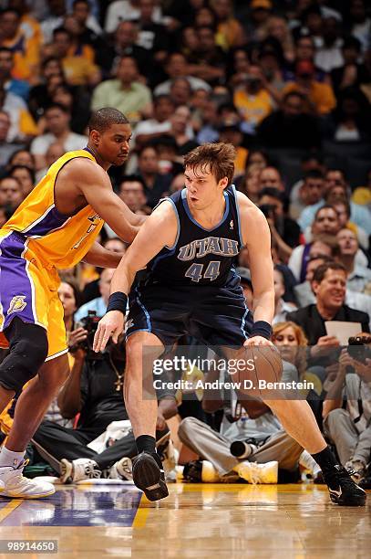 Kyrylo Fesenko of the Utah Jazz posts up against Andrew Bynum of the Los Angeles Lakers in Game Two of the Western Conference Semifinals during the...