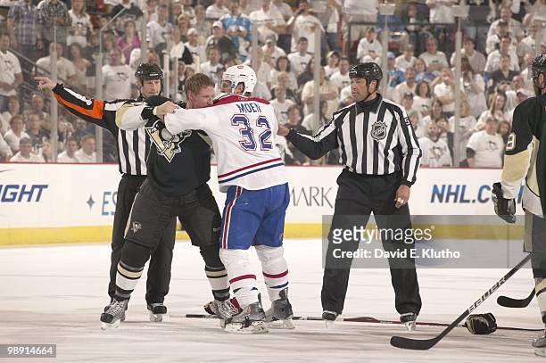 Pittsburgh Penguins Mark Eaton in action during fight vs Montreal Canadiens Travis Moen . Game 1. Pittsburgh, PA 4/30/2010 CREDIT: David E. Klutho