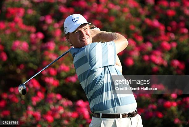Ernie Els of South Africa watches his tee shot on the 18th hole during the second round of THE PLAYERS Championship held at THE PLAYERS Stadium...