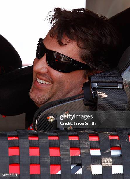 Tony Stewart, driver of the Old Spice / Office Depot Chevrolet sits in his car during qualifying for the NASCAR Sprint Cup series SHOWTIME Southern...